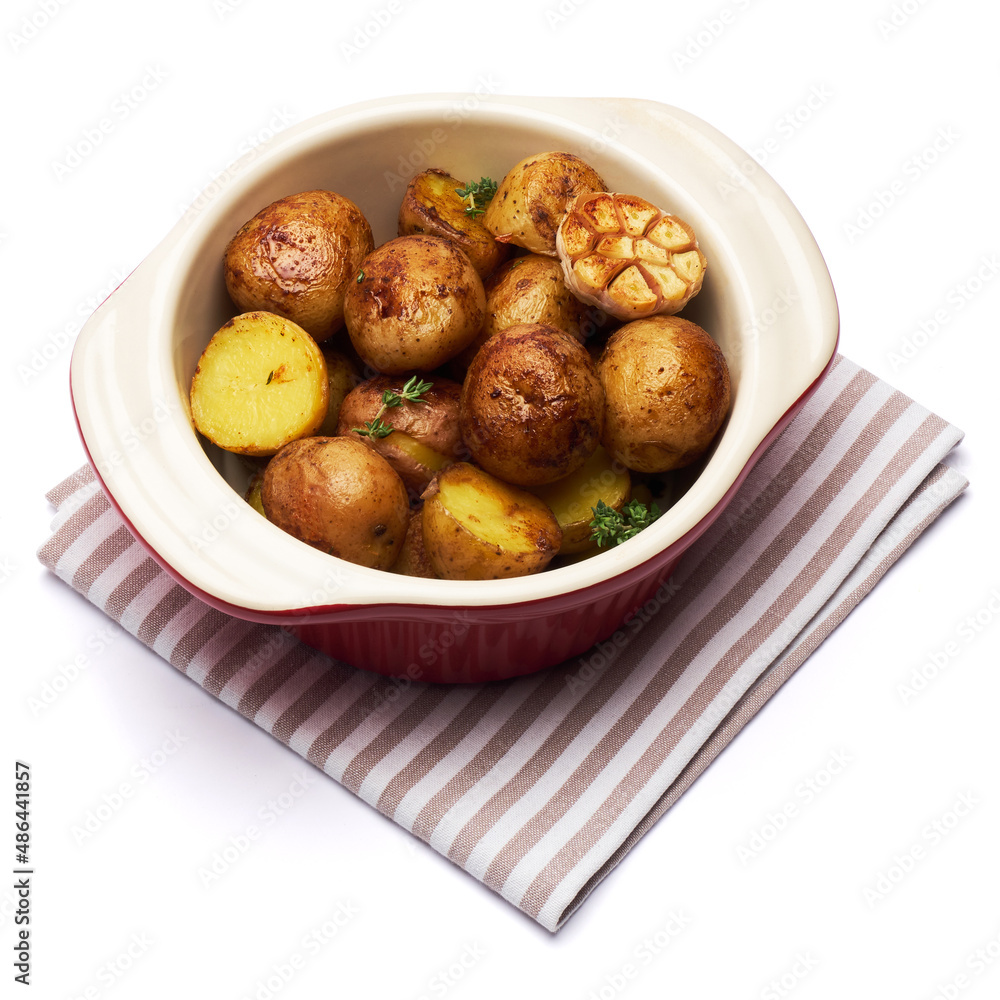 Baked potato in a clay pot isolated on white background Baked potato in a clay pot isolated on white background