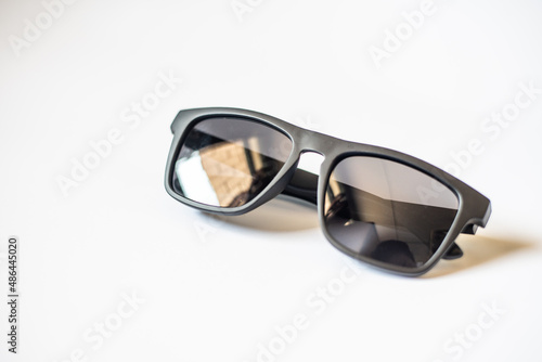 Close up sunglasses on white background.