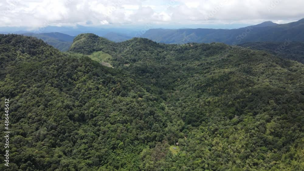 Top view sun rays spread over many mountains. Nature is covered with green plants and sunlight. Phu Thap Boek , Thailand. Top view sun rays spread over many mountains. Nature is covered with green plants and sunlight. Phu Thap Boek , Thailand.