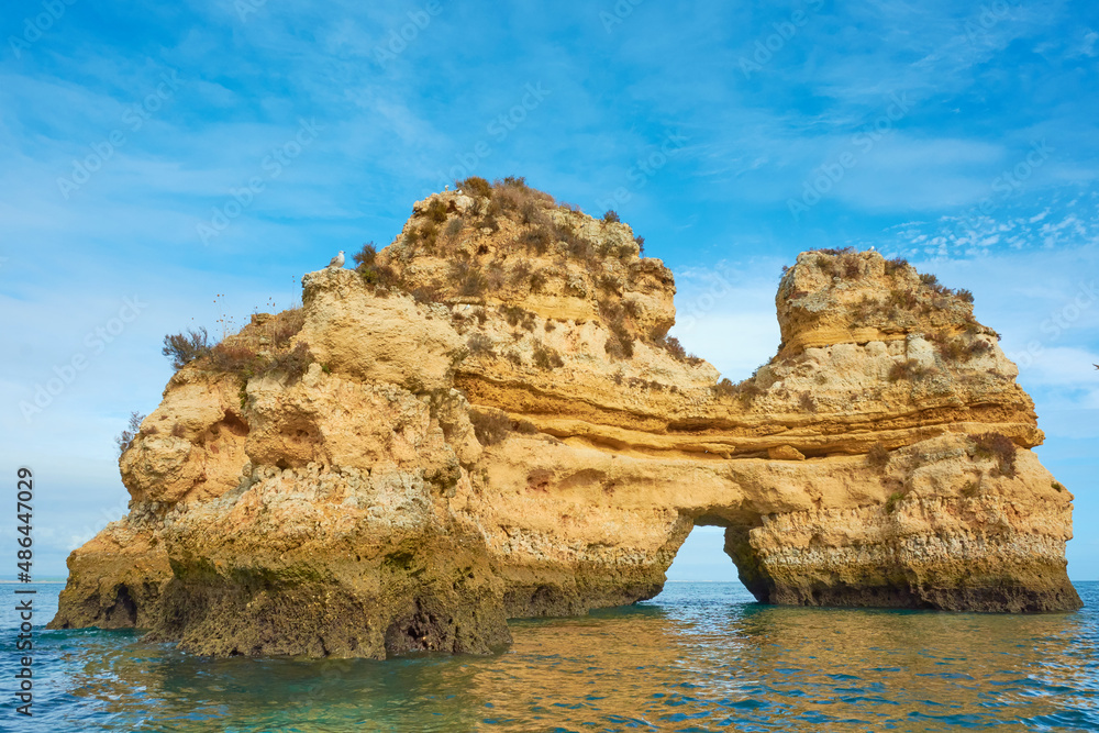 Fototapeta premium Beautiful Algarve coast with its beautiful caves and rocks