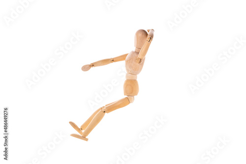 a wooden man sits with his hand behind his head isolated on a white background
