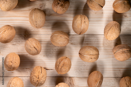 walnuts on a wooden surface top view