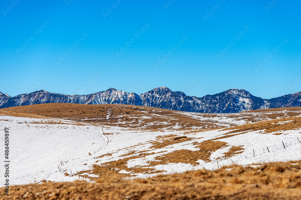 Mountain range of Monte Baldo (Baldo Mount) in winter view from Lessinia Plateau Regional Natural Park. Bosco Chiesanuova municipality, Verona Province, Veneto and Trentino-Alto Adige, Italy, Europe.