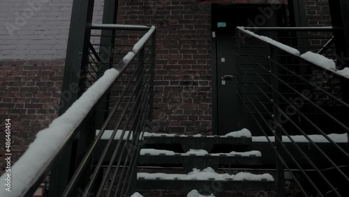 Iron staircase at the back of the building leading to the back entrance