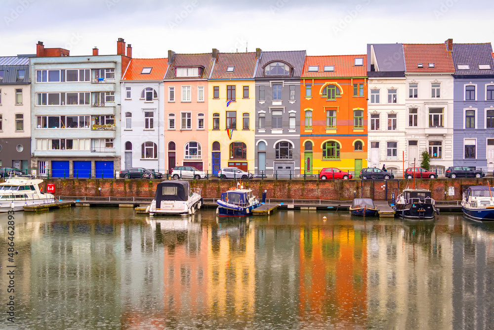 Houses and boats along the Leie river, ghent, belgium 