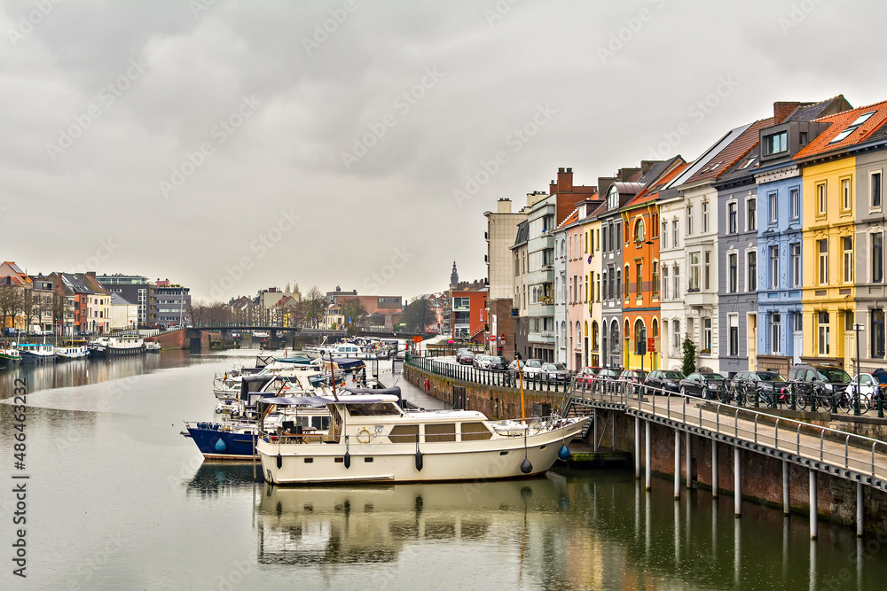 Houses and boats along the Leie river, Ghent, Belgium	