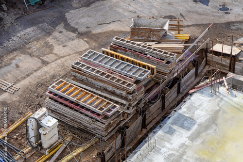 Stacked aluminum formwork at a construction site. Cast concrete in the construction of buildings. Casting concrete into aluminum molds