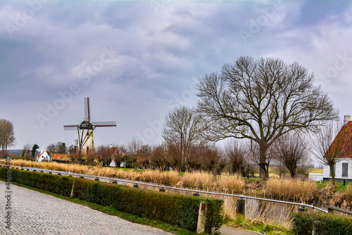 Windmill by the Damme canal, between Bruges and Damme in Belgian province of West Flanders, Belgium