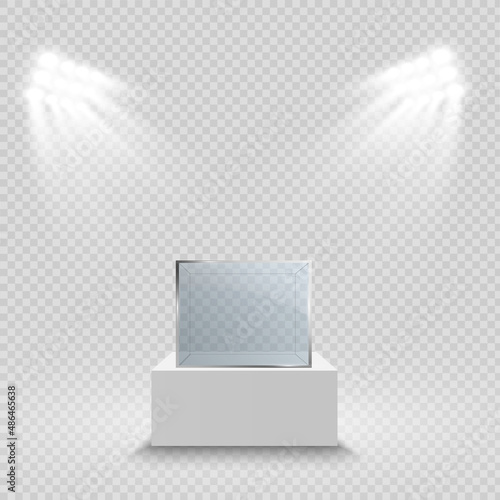 Glass showcase for the exhibition in the form of a cube. Background for sale illuminated by spotlights. Museum glass box isolated advertising or business design boutique. Exhibition hall.

