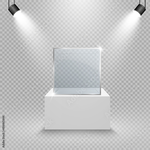 Glass showcase for the exhibition in the form of a cube. Background for sale illuminated by spotlights. Museum glass box isolated advertising or business design boutique. Exhibition hall.
