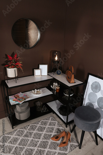 Hallway interior with console table and stylish decor, above view