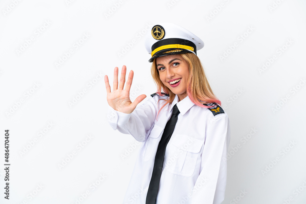 Airplane pilot over isolated white background counting five with fingers Airplane pilot over isolated white background counting five with fingers