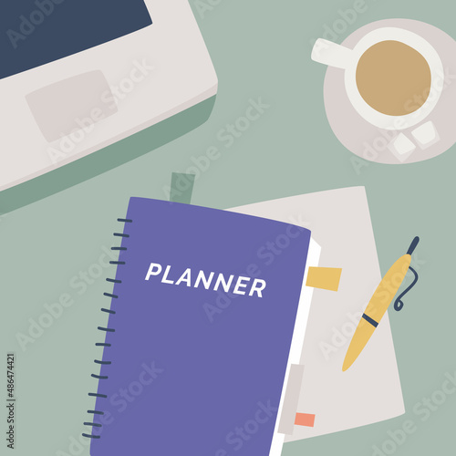 Time planning concept. Top view of notepad with word planner on desktop, pencil, coffee, sticker.