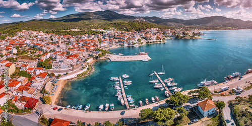 Aerial panorama of a scenic resort town Neos Marmaras with yacht marina sea port in Halkidiki, Sithonia. Travel attractions and vacation in Greece © EdNurg