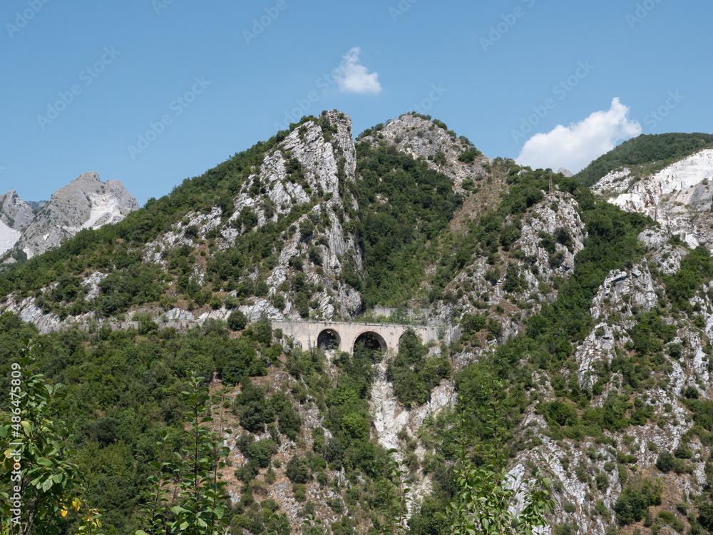 Bridge among Mountain in Carrara, site of the Old Private Marble Railway - Tuscany, Italy