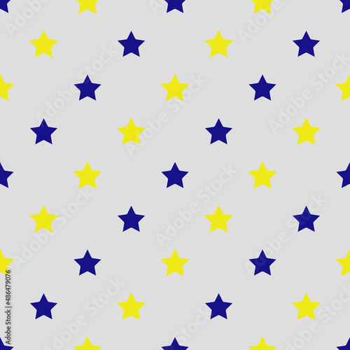 Seamless pattern with blue and eylow stars on a grey background. Vector photo