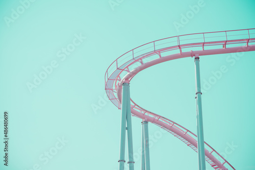 Print op canvas Pink pastel looping roller coaster on blue sky sunny day retro tone