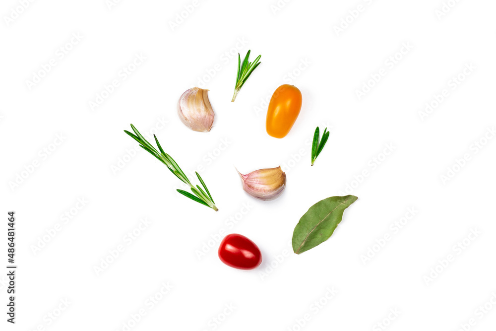 Various herbs and spices isolated on white background. Top view image rosemary, garlic, tomatoes and Laurel leaf with copy space. Various herbs and spices isolated on white background. Top view image rosemary, garlic, tomatoes and Laurel leaf with copy space.