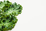 Close up of kale leaves on white background. copy space for text
