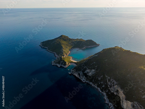 Aerial drone view of famous porto timoni beach in afionas village corfu , greece photo