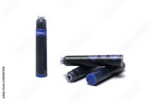 Closeup plastic ink cartridges fountain white background