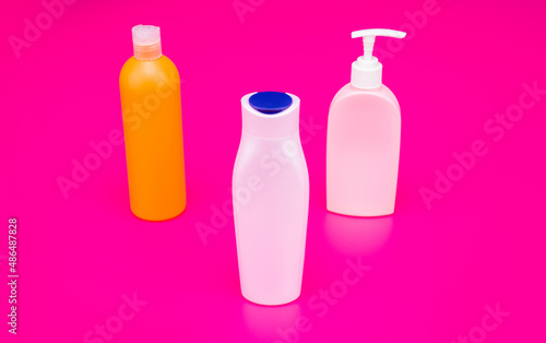 Refillable HDPE cosmetic bath product containers with flip caps and pump dispenser, bottles