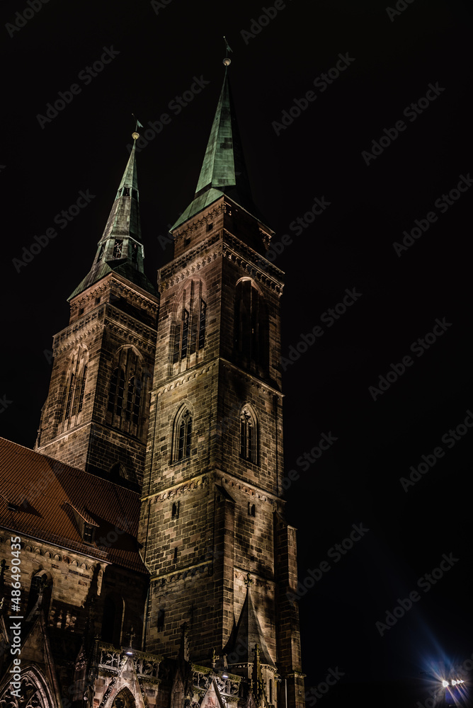 Neurenberg, Bavaria - Germany - 07 26 2018:  Low angle view of the twin towers of the Saint Sebaldus church