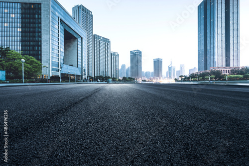 Asphalt road High way Empty curved road clouds and sky at sunset