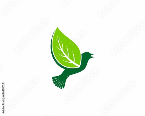 Flying bird with green leaf as wings