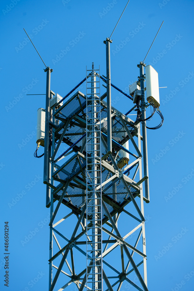Telecommunication concrete tower with antennas. LTE, GSM, 2G, 3G, 4G, 5G tower of cellular communication Telecommunication concrete tower with antennas. LTE, GSM, 2G, 3G, 4G, 5G tower of cellular communication
