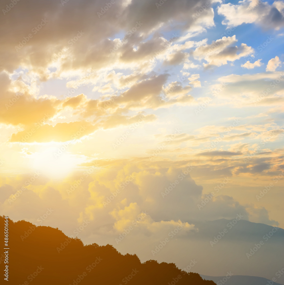 mount slope silhouette in dense clouds at the sunset, natural travel background mount slope silhouette in dense clouds at the sunset, natural travel background
