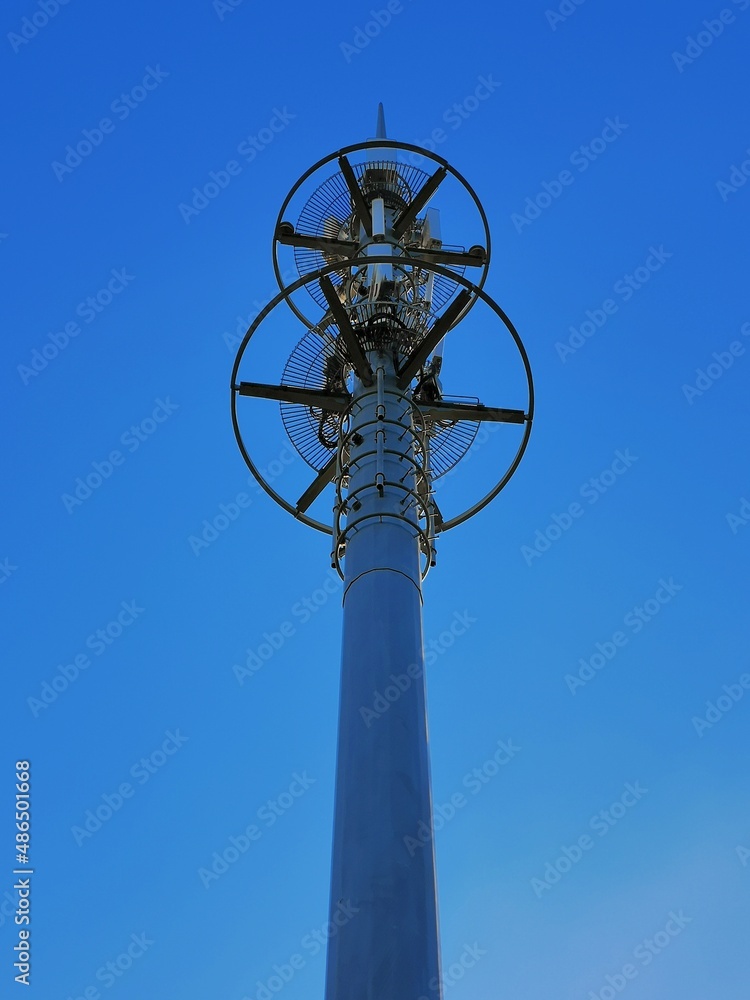 Large lightning rod tower against a blue sky background Large lightning rod tower against a blue sky background