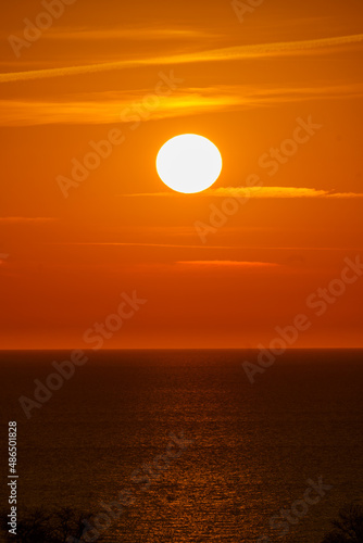 Fototapeta Naklejka Na Ścianę i Meble -  Sunset over water.  Sunrise over sea
