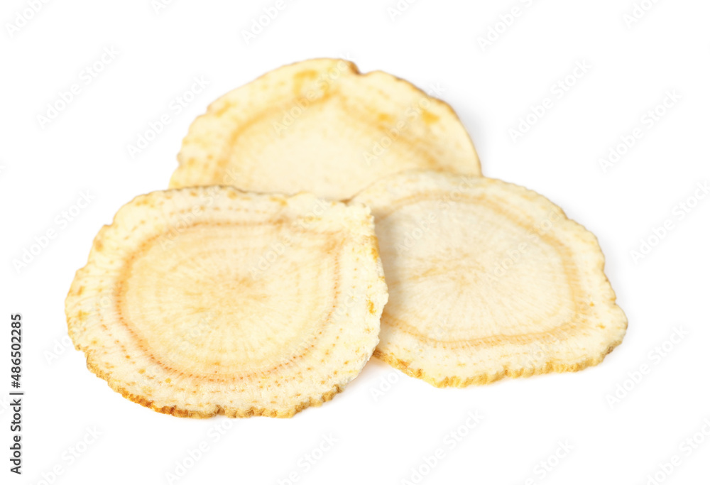 Close up of ginseng slices isolated on white background. Close up of ginseng slices isolated on white background.