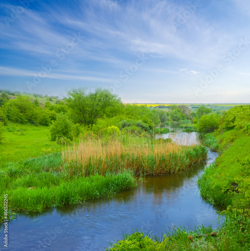 quiet river flow among green hills, outdoor summer natural scene