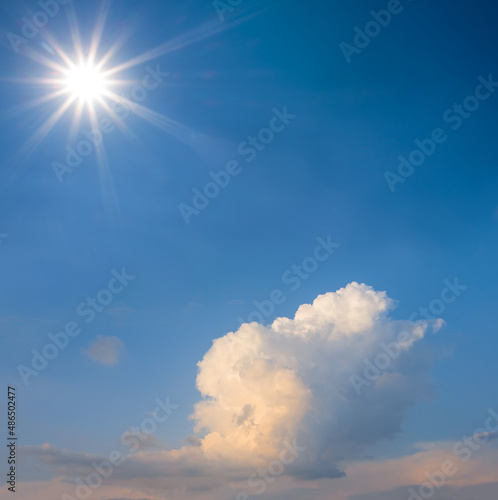 sparkle sun on dense cloudy sky background