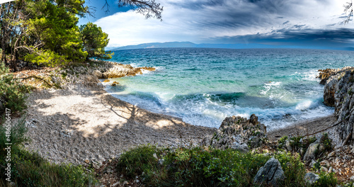 Fototapeta Naklejka Na Ścianę i Meble -  Secret Beach At The Coast Of The Mediterranean Sea Near Rabac In Istria In Croatia