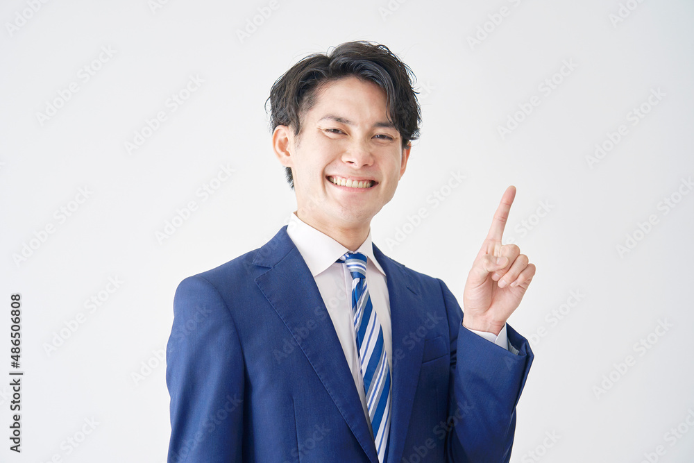 ビジネスマン　指差し　白背景