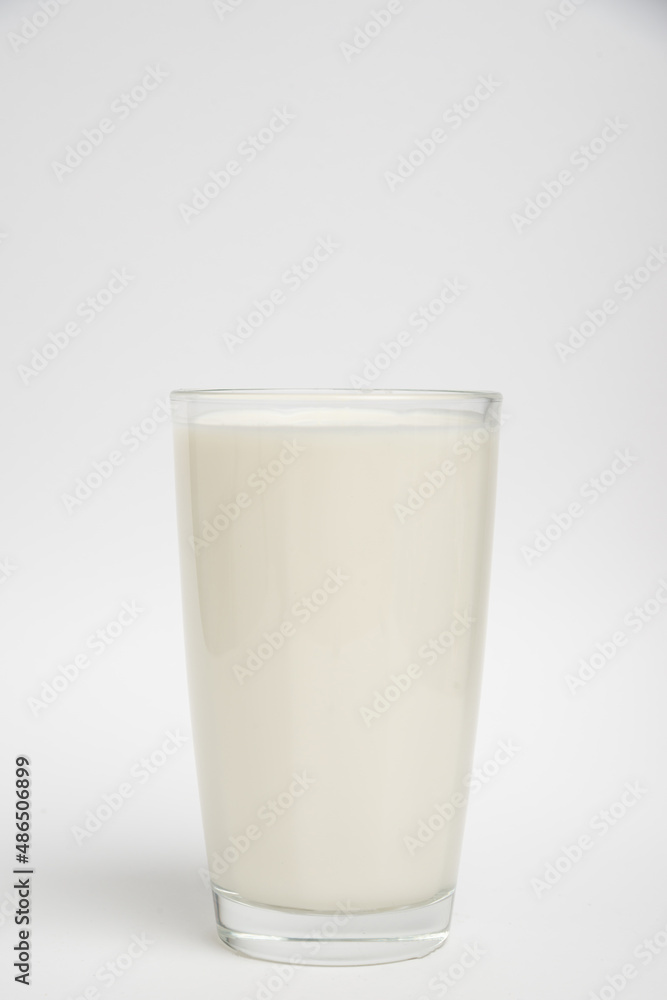 Milk glass closeup on white background Milk glass closeup on white background