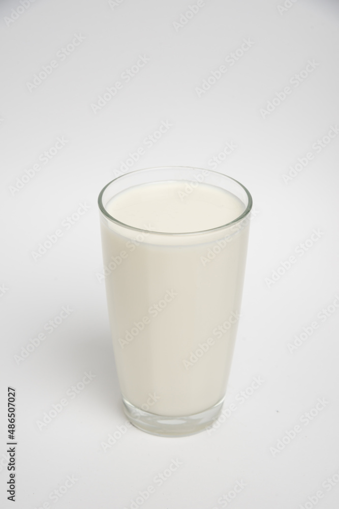 Milk glass closeup on white background Milk glass closeup on white background
