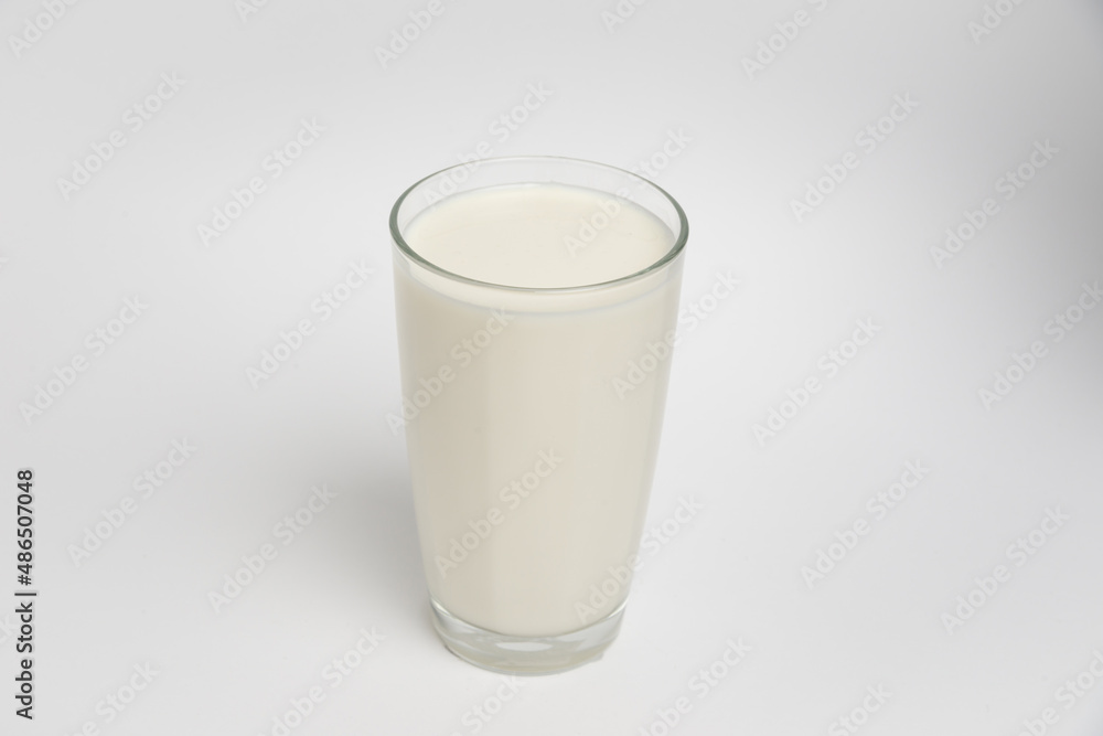Milk glass closeup on white background Milk glass closeup on white background