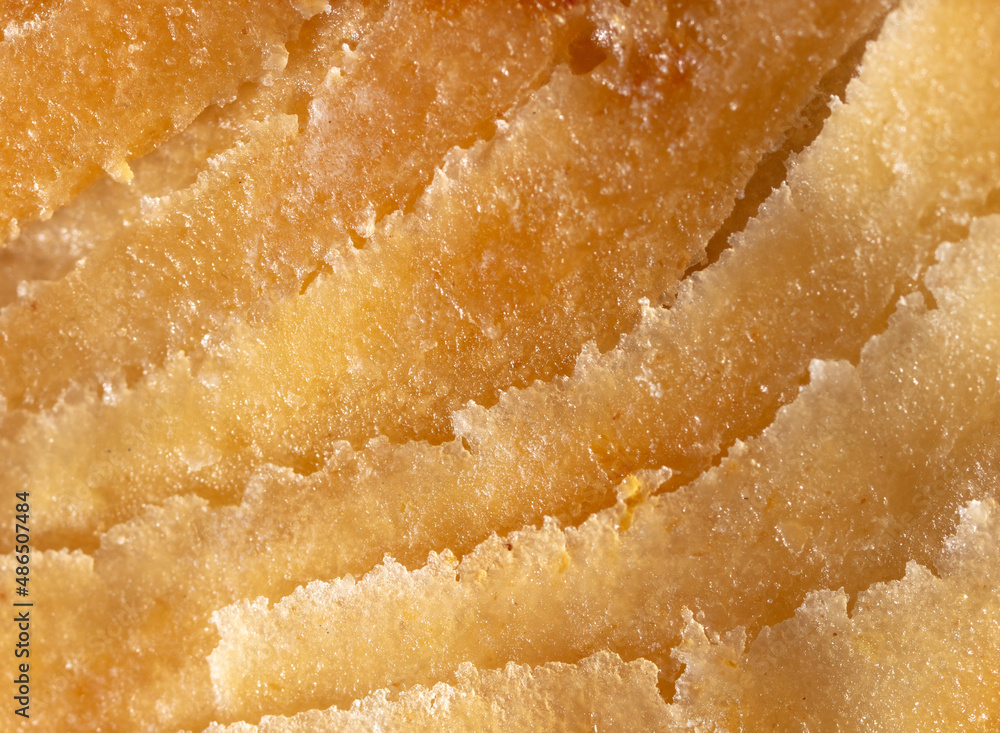Golden crust of puff pastry as a background. Golden crust of puff pastry as a background.