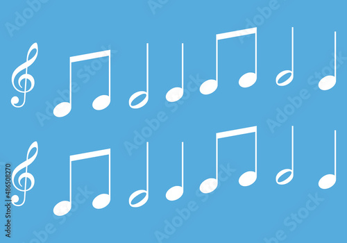 Notas musicales blancas en fondo azul. 