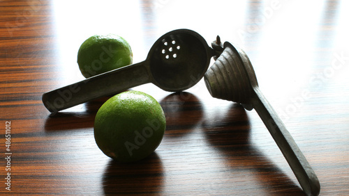 Εκτύπωση καμβά Kitchenware lemon squeezer with lemons on the table with window light