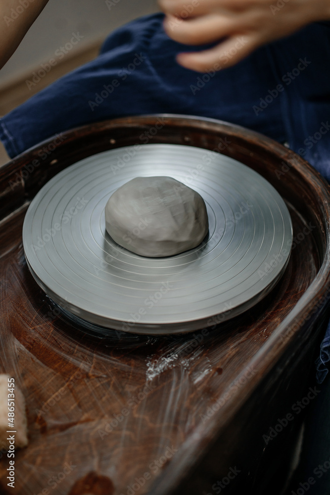 Fototapeta premium Clay on a potter's wheel