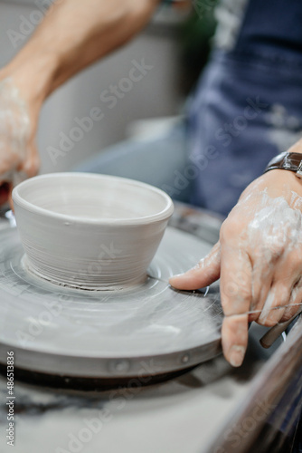 Modeling clay on a potter's wheel