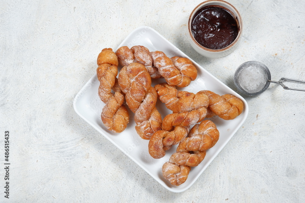 Fototapeta premium korean Twisted doughnuts or Bread Stick,kkwabaegi,also known in the philippines as Shakoy or pilipit