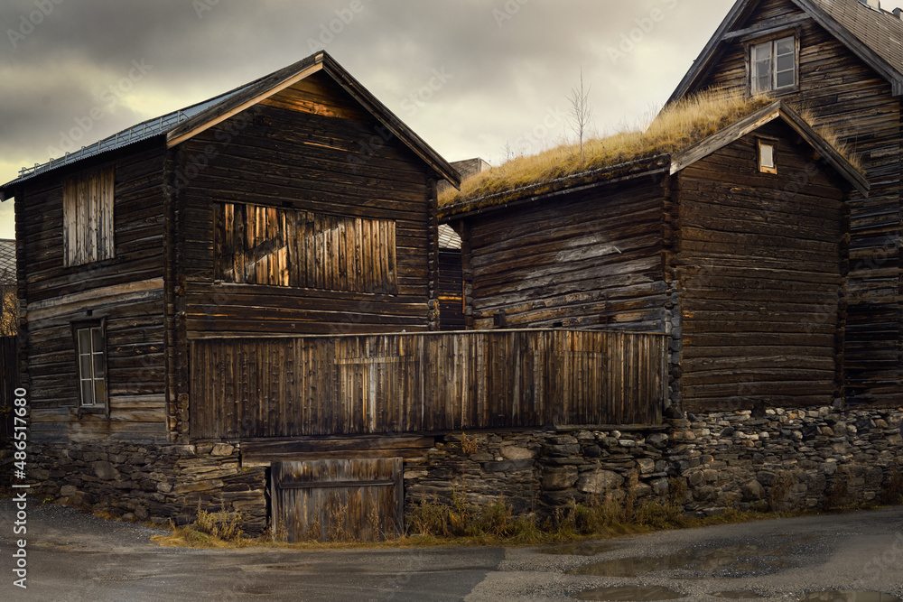 Old wooden houses of Norway, with grasses on the roof. Old wooden houses of Norway, with grasses on the roof.