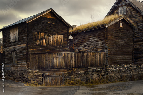 Old wooden houses of Norway, with grasses on the roof.