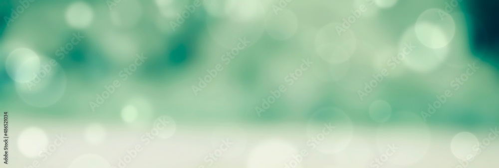 Obraz premium Spring background - abstract banner - green blurred bokeh lights - 